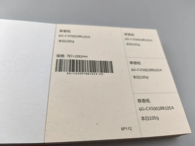 Natural white, visible fibres; photographed paper sample book with original labels