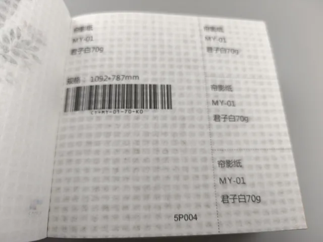 Fine grid texture; photographed paper sample book with original labels