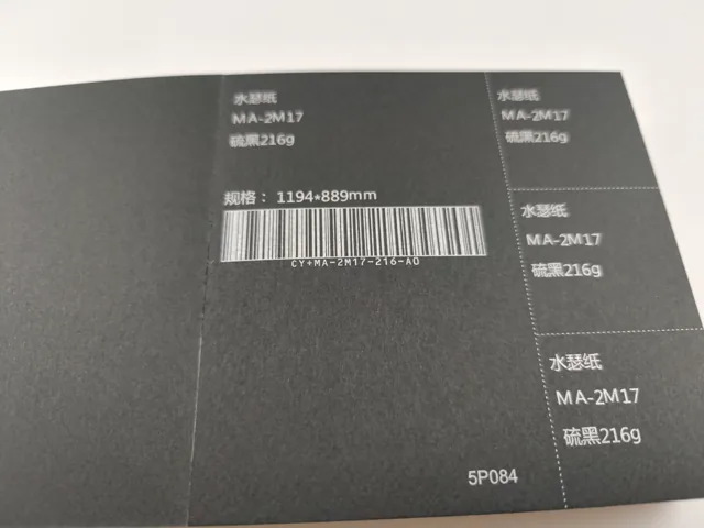 Dark paper swatches; photographed paper sample book with original labels